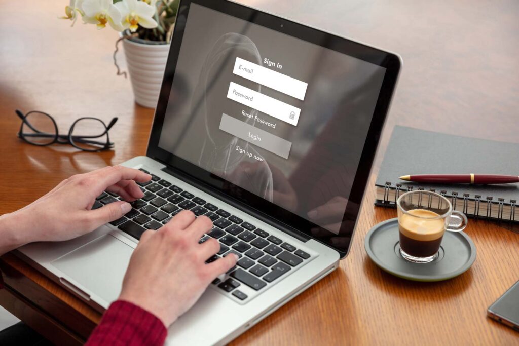 Typing on laptop
